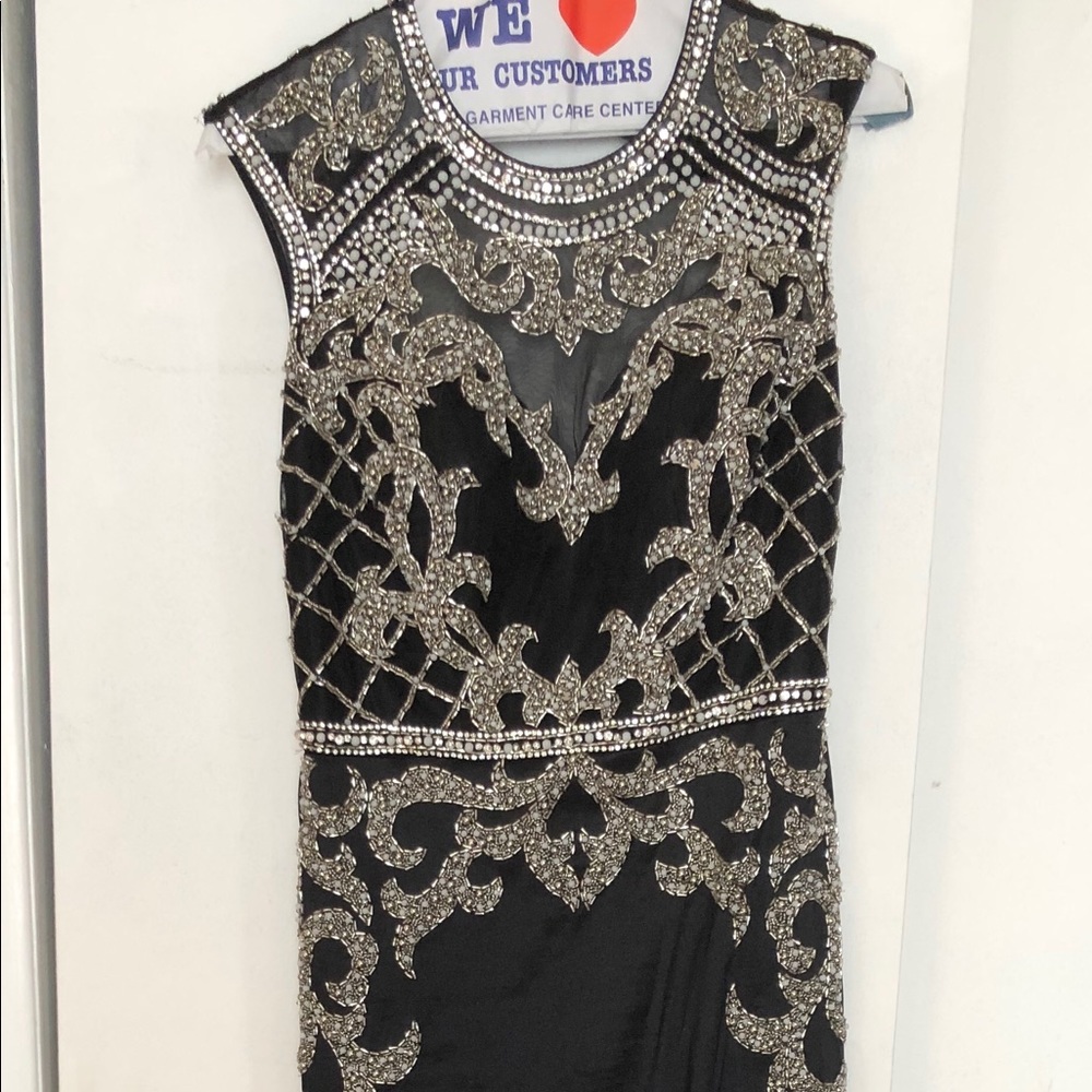 Black formal sleeveless open back gown